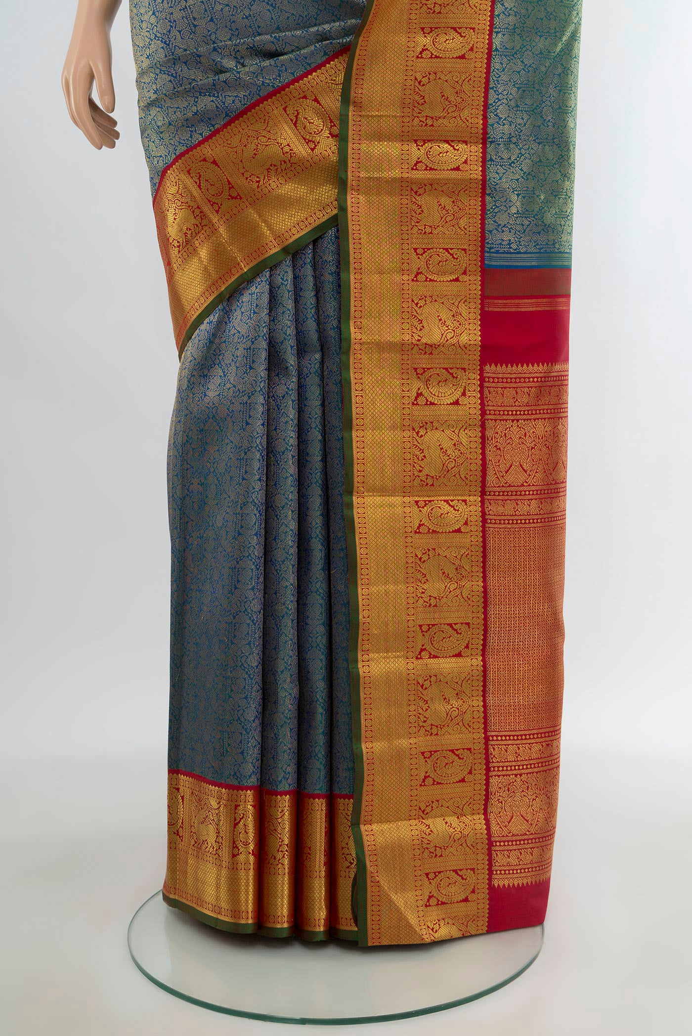 Pleats and pallu of Pure Silk Pure Zari Blue Kanjivaram Saree with Zari Brocade on the body and Zari Border. 