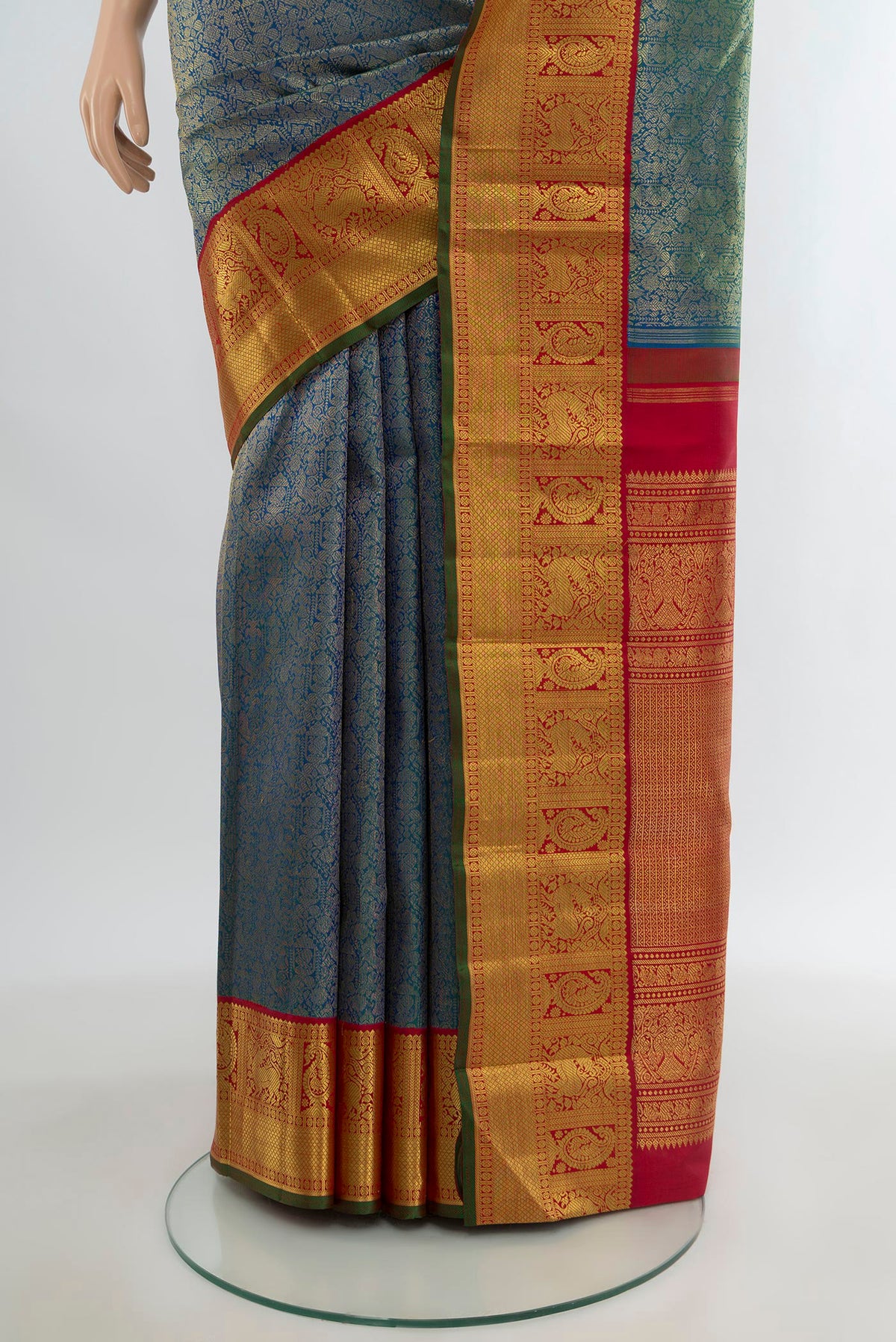 Pleats and pallu of Pure Silk Pure Zari Blue Kanjivaram Saree with Zari Brocade on the body and Zari Border. 