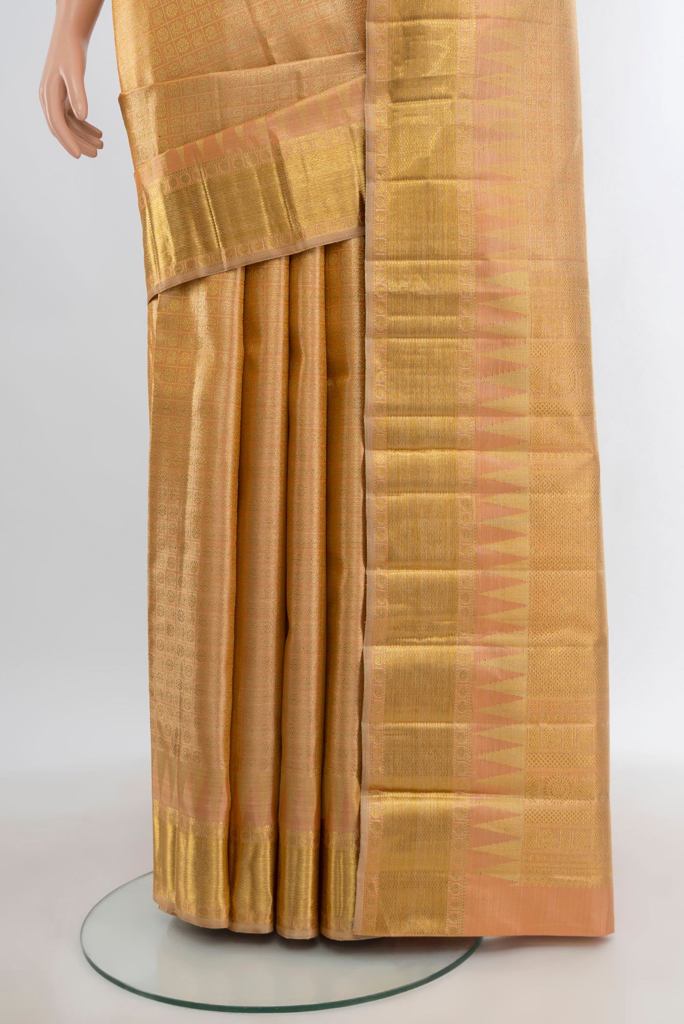 Pleats and pallu of Pure Silk Pure Zari Sandal Kanjivaram Tissue Saree with Zari Brocade on the body and Zari Border. 