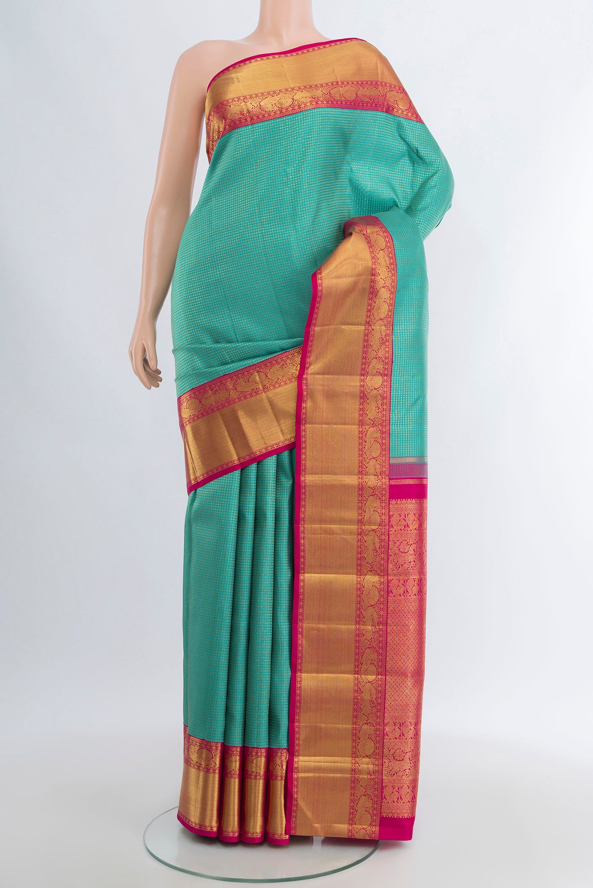 Pure Silk Pure Zari Light Blue Kanjivaram Saree with Zari Brocade on the body and Zari Border.  displayed on a mannequin
