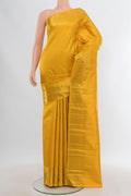 Pure Silk Pure Zari Yellow Kanjivaram Saree with Zari Brocade on the body and Zari Border.  displayed on a mannequin