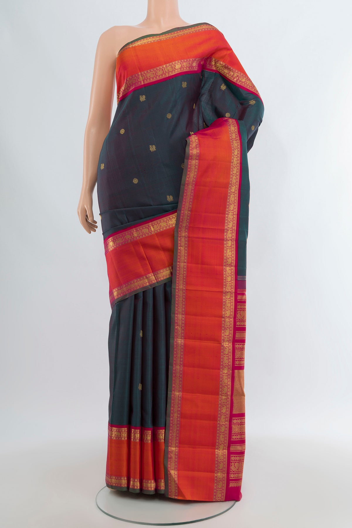 Pure Silk Pure Zari Multi Color Kanjivaram Saree with Zari Butta on the body and Zari Border.  displayed on a mannequin