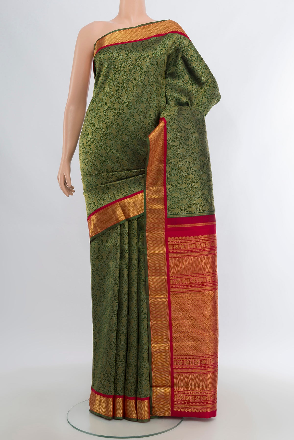 Pure Silk Pure Zari Bottle Green Kanjivaram Saree with Zari Brocade on the body and Zari Border.  displayed on a mannequin