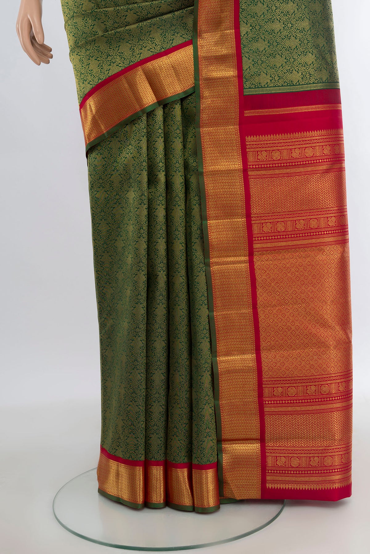 Pleats and pallu of Pure Silk Pure Zari Bottle Green Kanjivaram Saree with Zari Brocade on the body and Zari Border. 