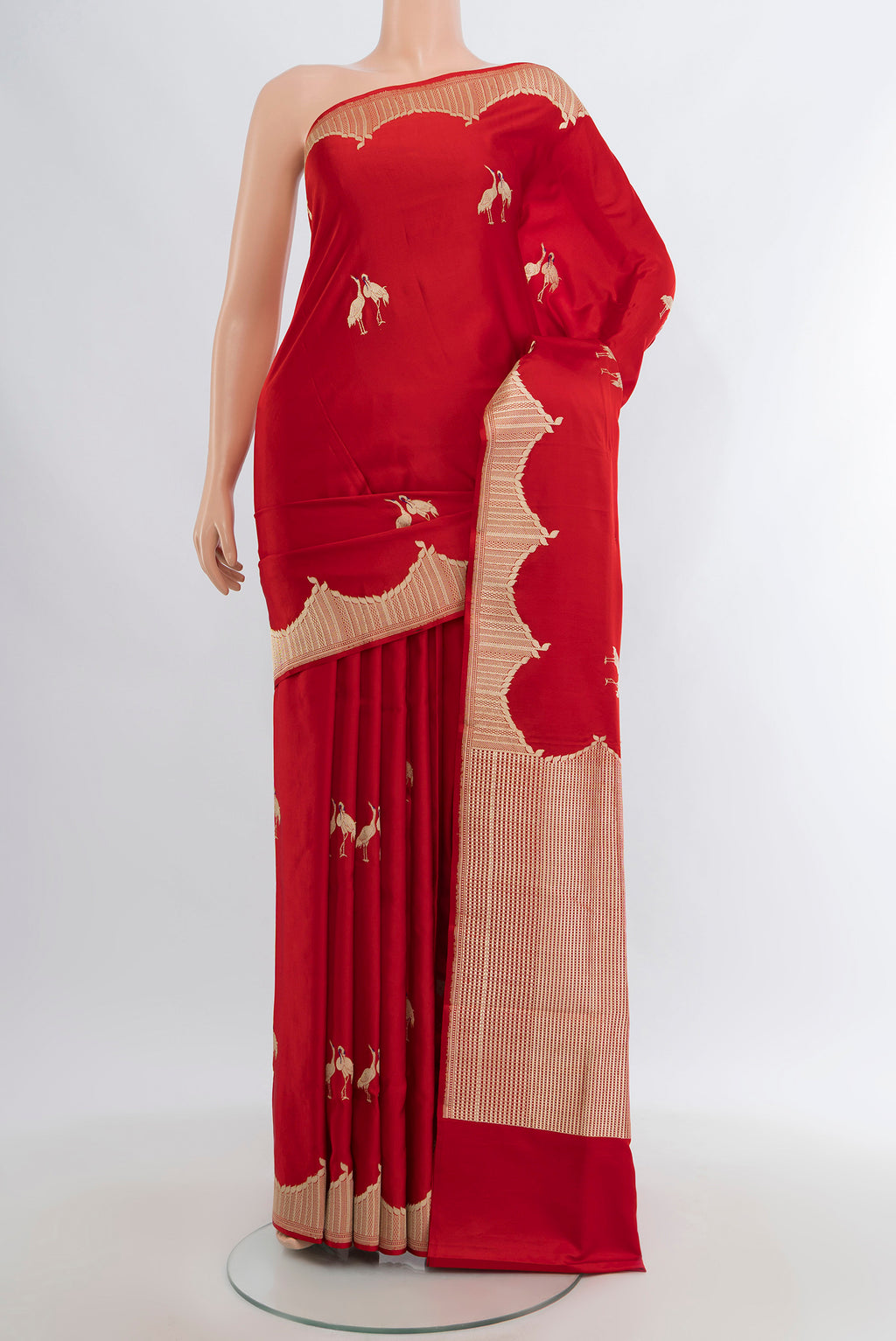 Red Banarasi Silk Saree with Zari Butta on the body and Zari Border.  displayed on a mannequin