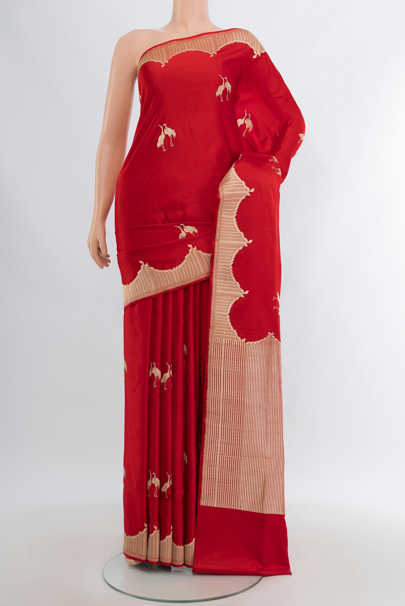 Red Banarasi Silk Saree with Zari Butta on the body and Zari Border.  displayed on a mannequin