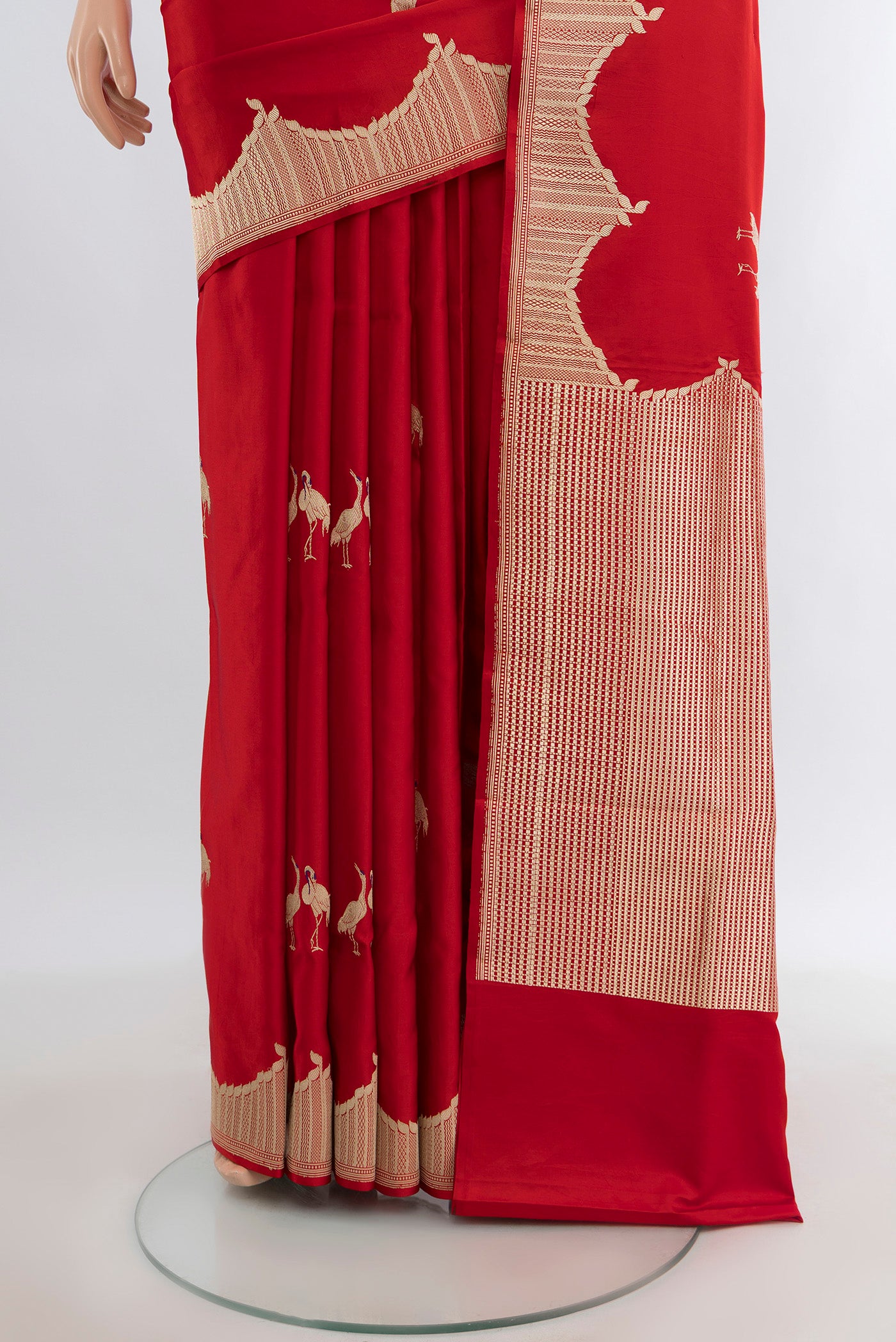 Pleats and pallu of Red Banarasi Silk Saree with Zari Butta on the body and Zari Border. 