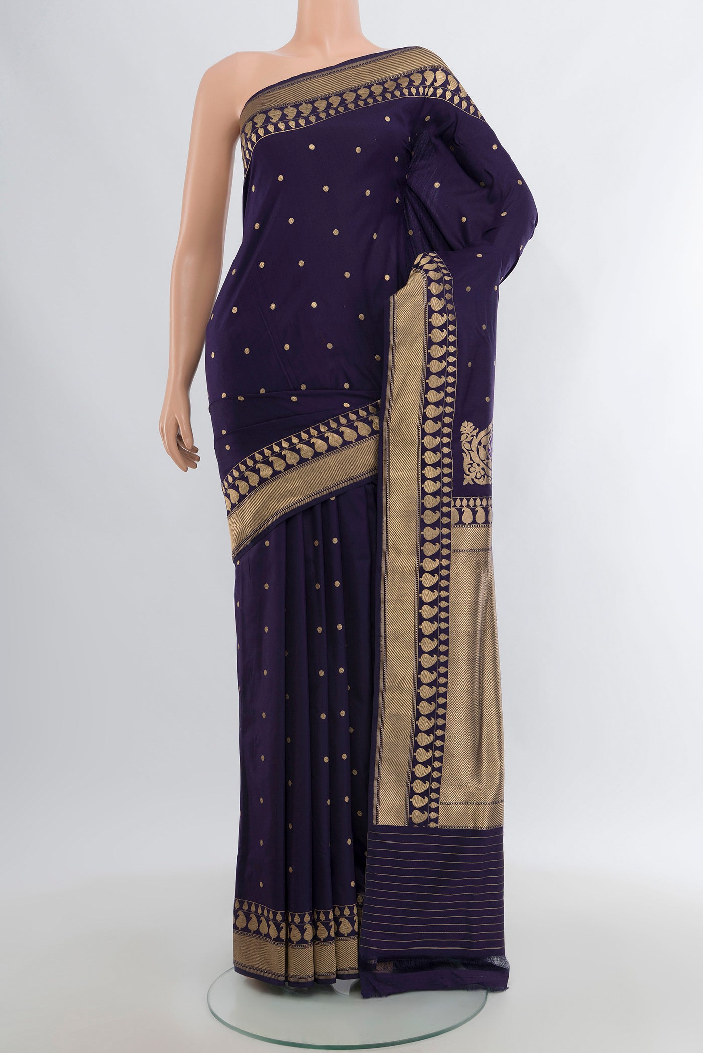 Navy Blue Banarasi Silk Saree with Zari Butta on the body and Zari Border.  displayed on a mannequin