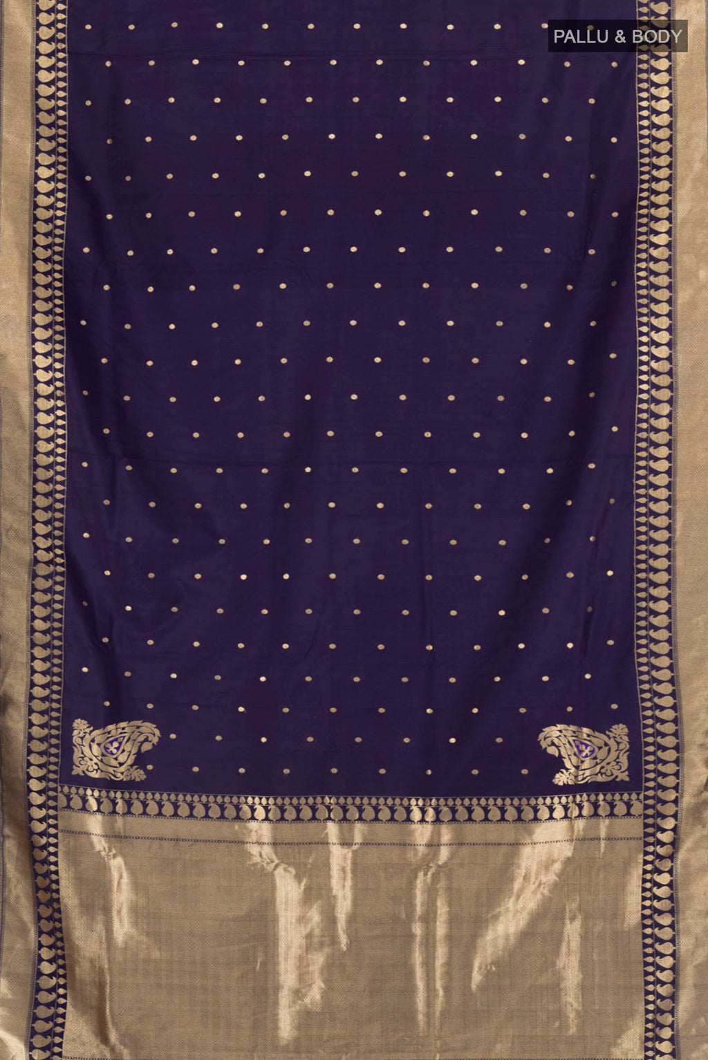 Flat view of Navy Blue Banarasi Silk Saree with Zari Butta on the body and Zari Border. 