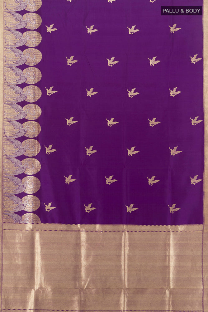 Flat view of Pure Silk Pure Zari Violet Banarasi Katan Saree with Zari Butta on the body and Silk Border. 