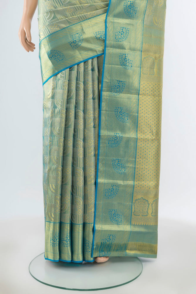 Pleats and pallu of Pure Silk Pure Zari Golden Kanjivaram Saree with Zari Butta on the body and Silk Border. 