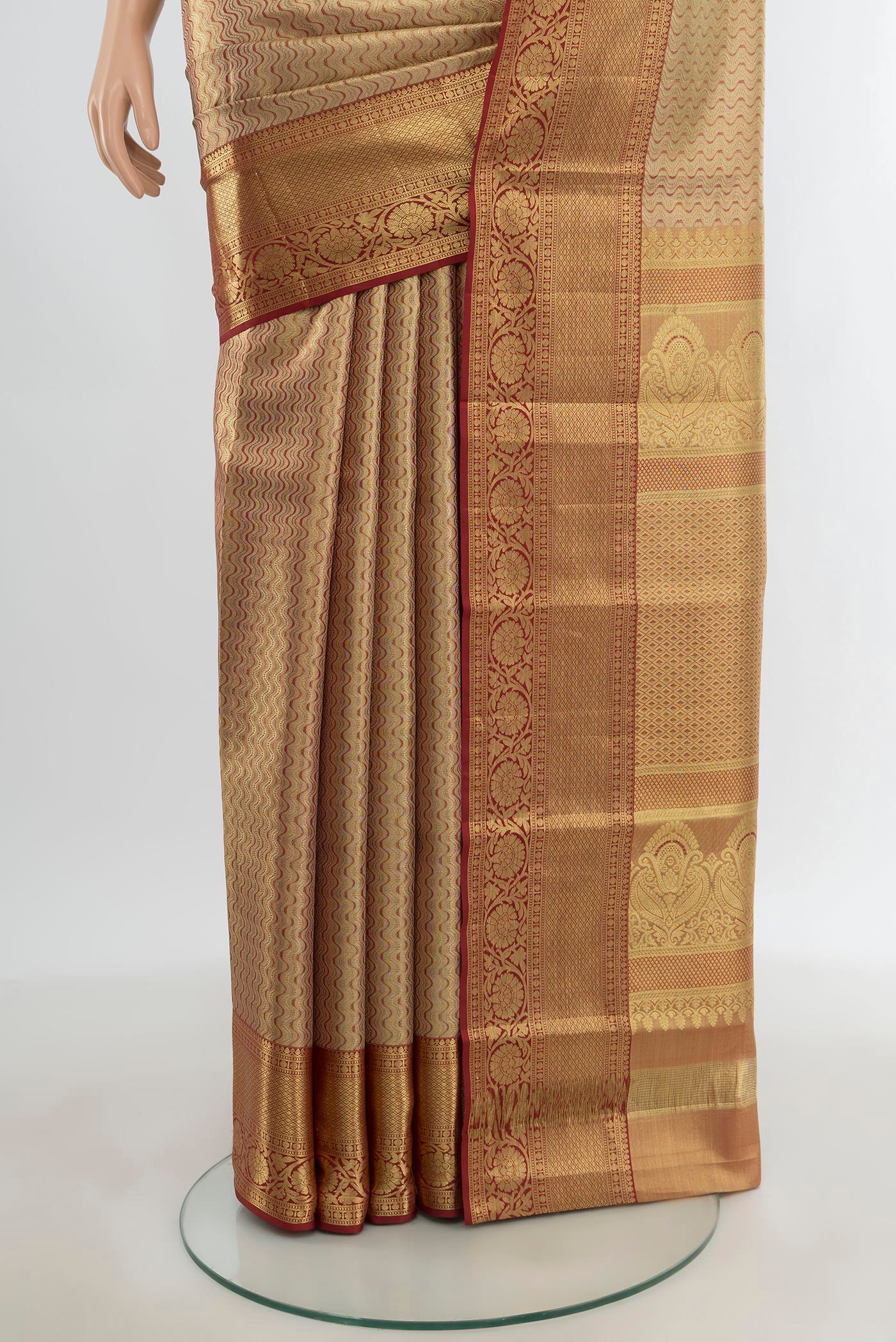 Pleats and pallu of Golden Kanjivaram Tissue Silk Saree with Zari Brocade on the body and Zari Border. 