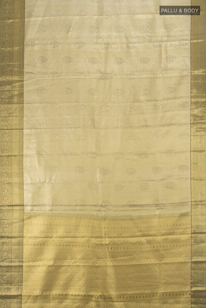 Flat view of Golden Kanjivaram Silk Saree with Zari Butta on the body and Silk Border. 