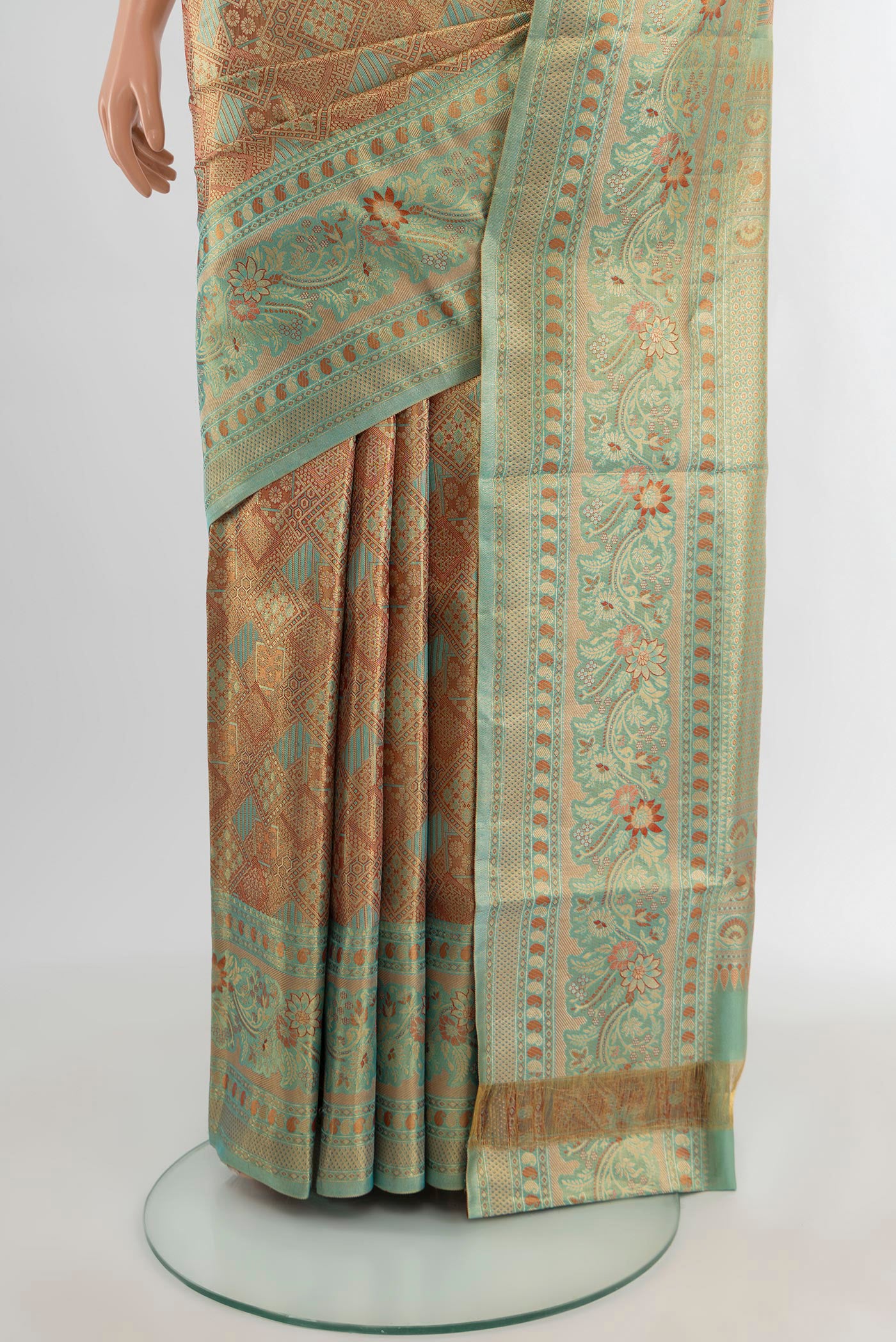 Pleats and pallu of Golden Kanchipuram Tissue Silk Saree with Zari Brocade on the body and Zari Border. 