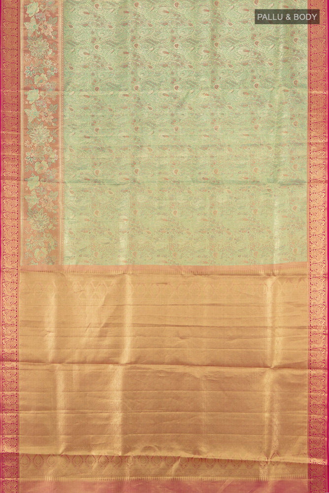 Flat view of Pure Silk Pure Zari Pista Green Kanchipuram Saree with Zari Butta on the body and Silk Border. 