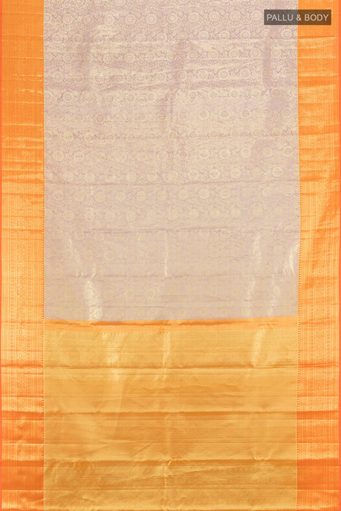 Flat view of Pure Silk Pure Zari Lavender Kanchipuram Saree with Zari Butta on the body and Silk Border. 