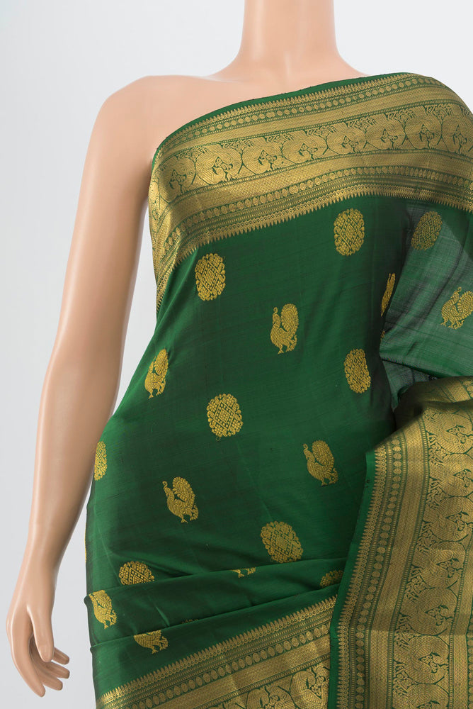 Border image of Pure Silk Pure Zari Bottle Green Kanjivaram Saree with Zari Butta on the body and Silk Border. 