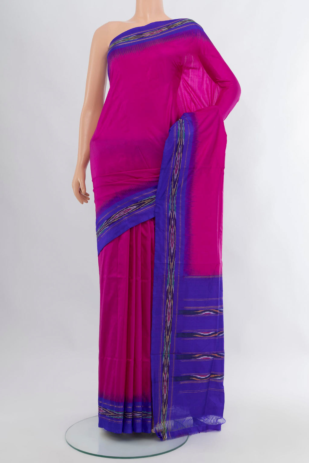 Magenta Pochampally Silk Saree with Plain Body and Ikat Border.  displayed on a mannequin