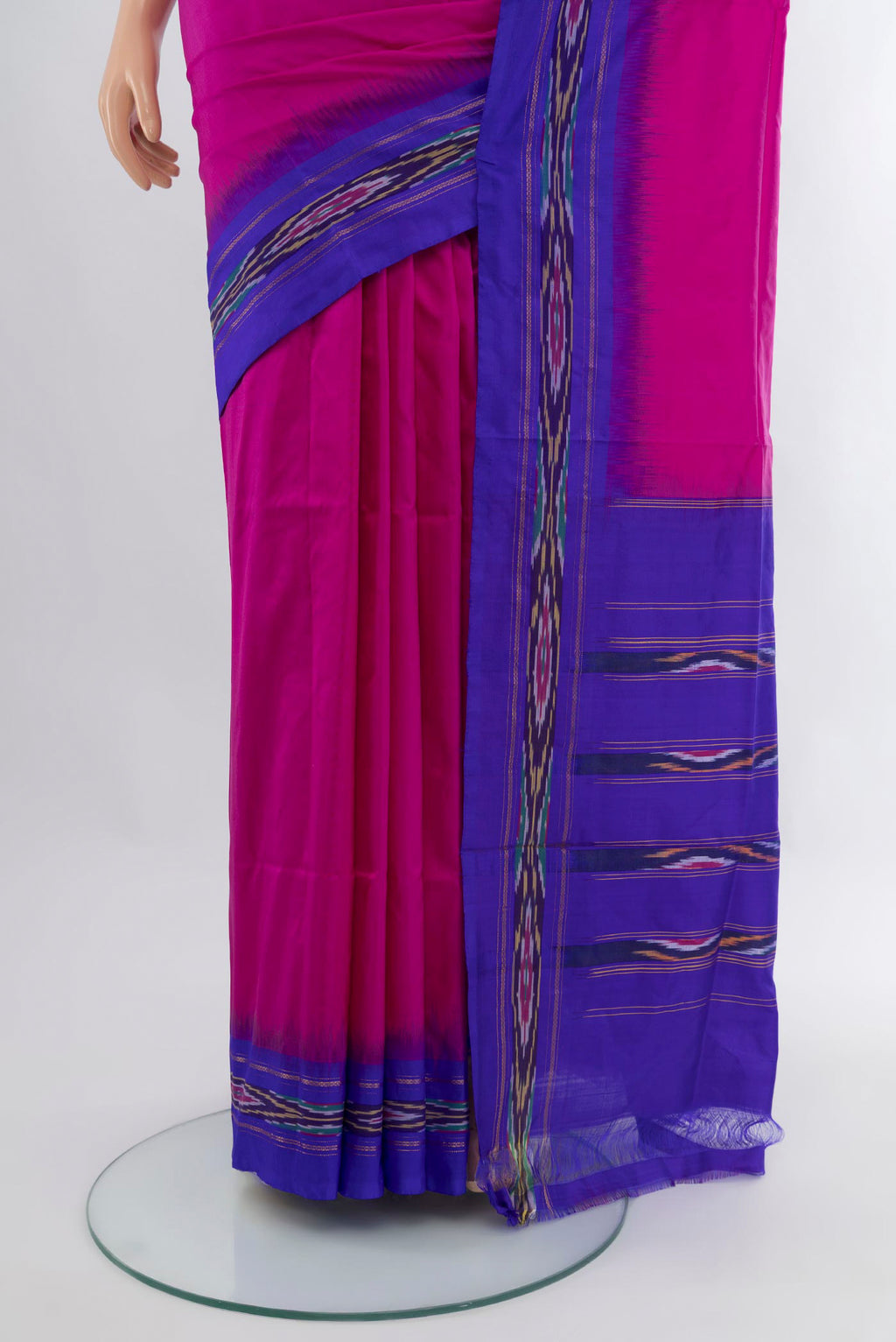 Pleats and pallu of Magenta Pochampally Silk Saree with Plain Body and Ikat Border. 