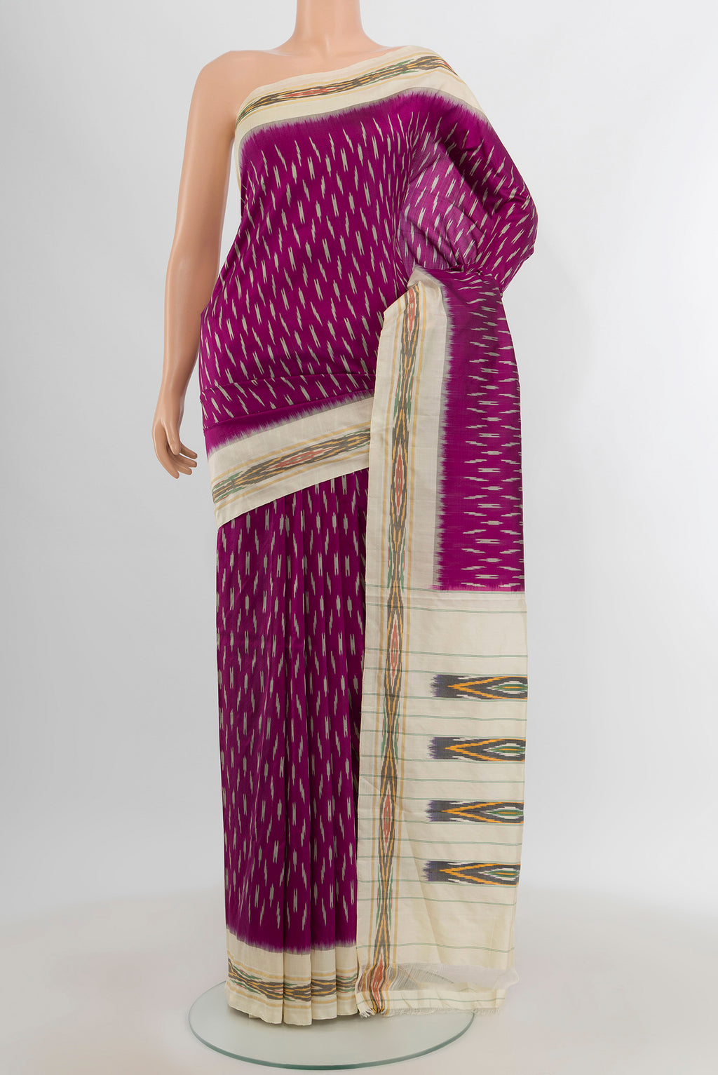 Purple Pochampally Silk Saree with Ikat design on the body and Ikat Border.  displayed on a mannequin