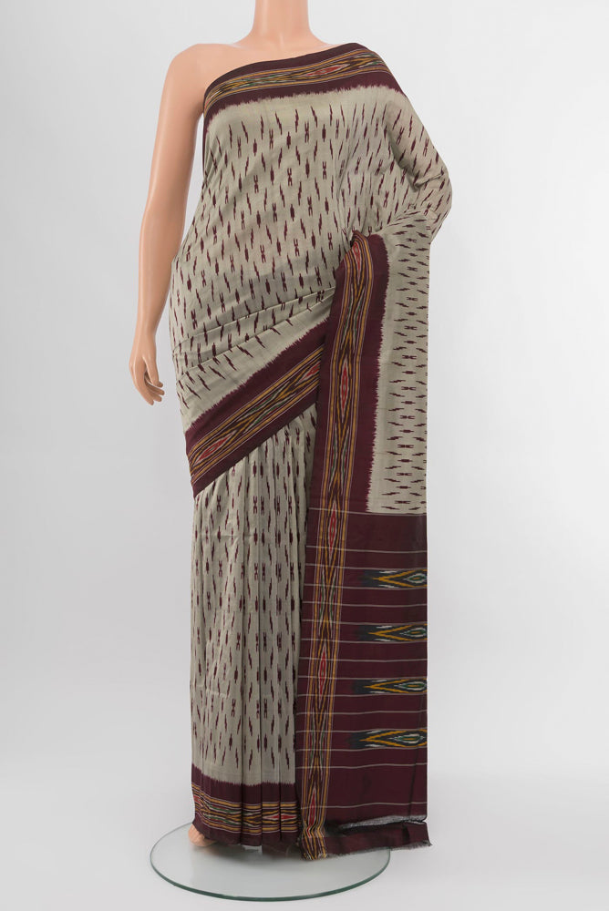 Davys Grey Pochampally Saree with Ikat Print on the body and Silk Border.  displayed on a mannequin