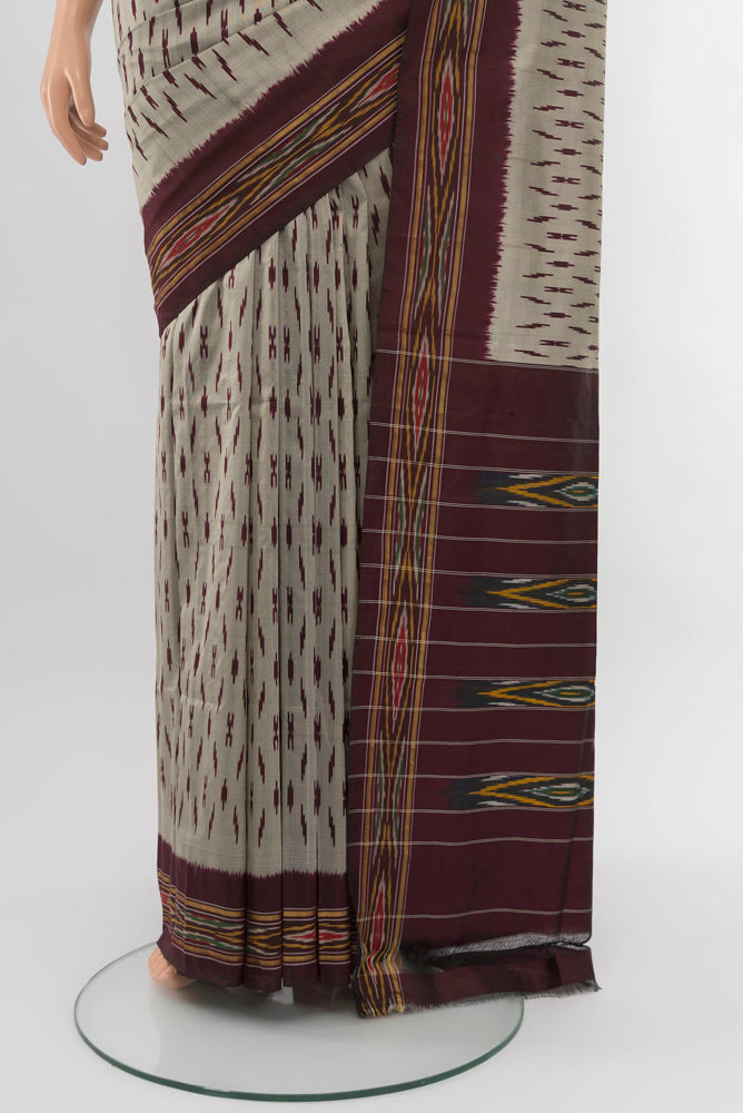 Pleats and pallu of Davys Grey Pochampally Saree with Ikat Print on the body and Silk Border. 