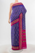 Navy Blue Pochampally Saree with Zari Butta on the body and Silk Border.  displayed on a mannequin