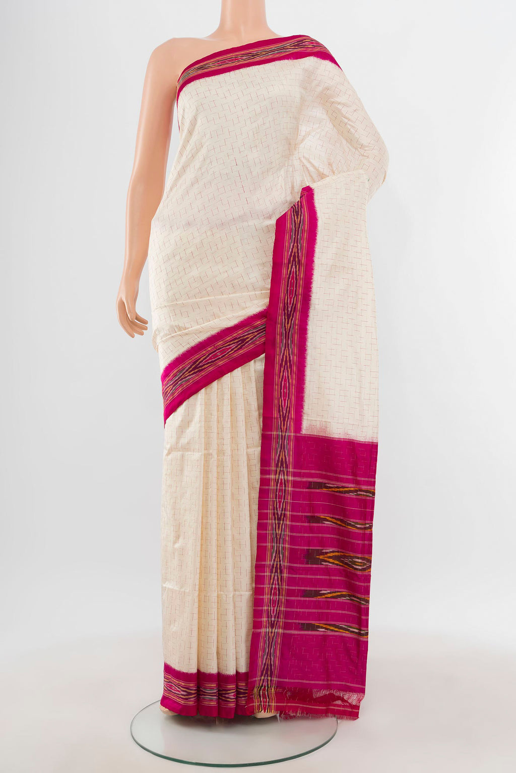Cream Pochampally Silk Saree with Ikat design on the body and Ikat Border.  displayed on a mannequin