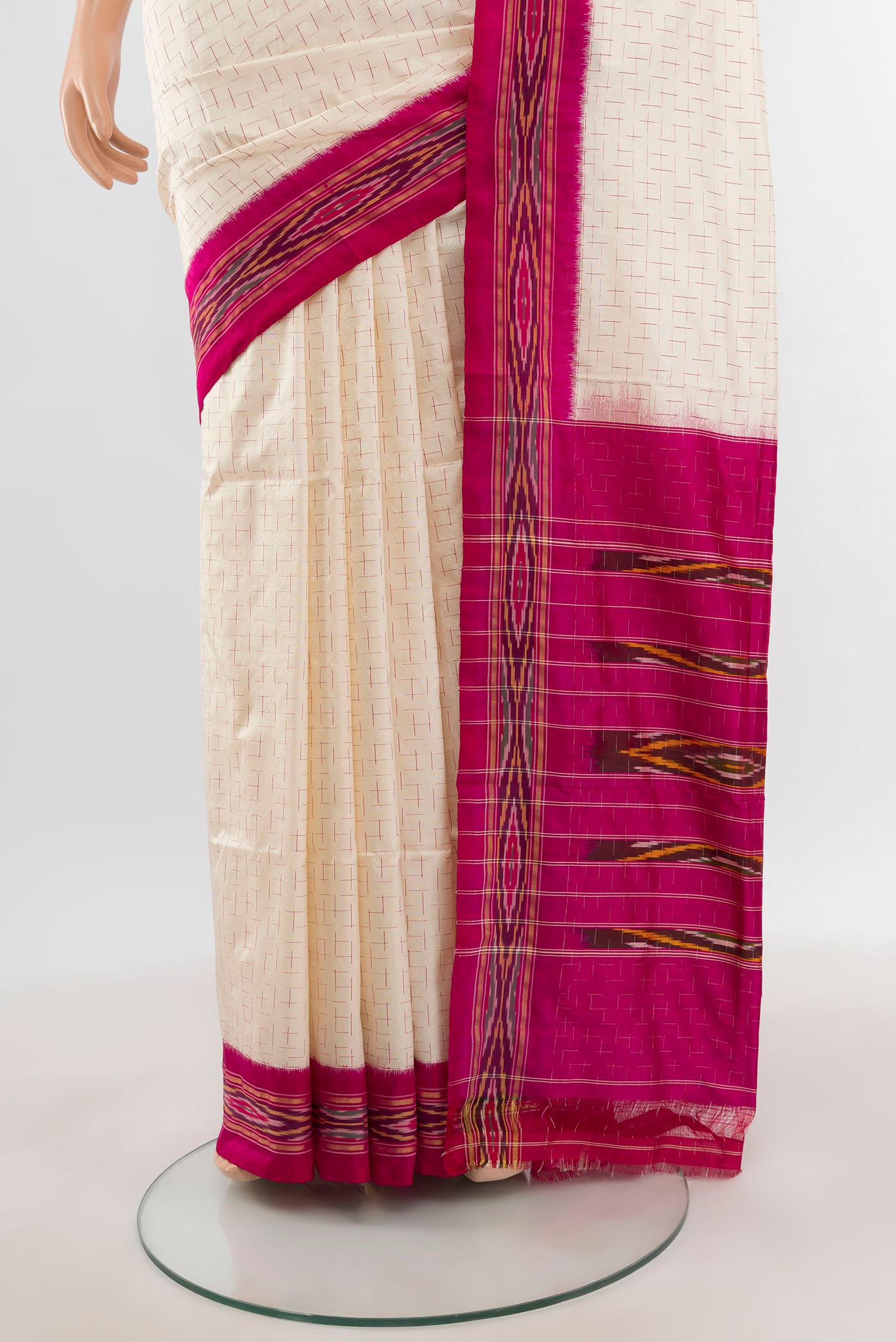Pleats and pallu of Cream Pochampally Silk Saree with Ikat design on the body and Ikat Border. 