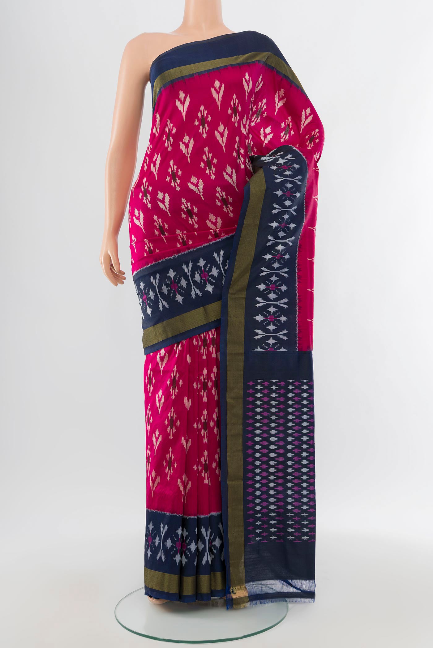 Purple Pochampally Saree with Ikat Print on the body and Silk Border.  displayed on a mannequin
