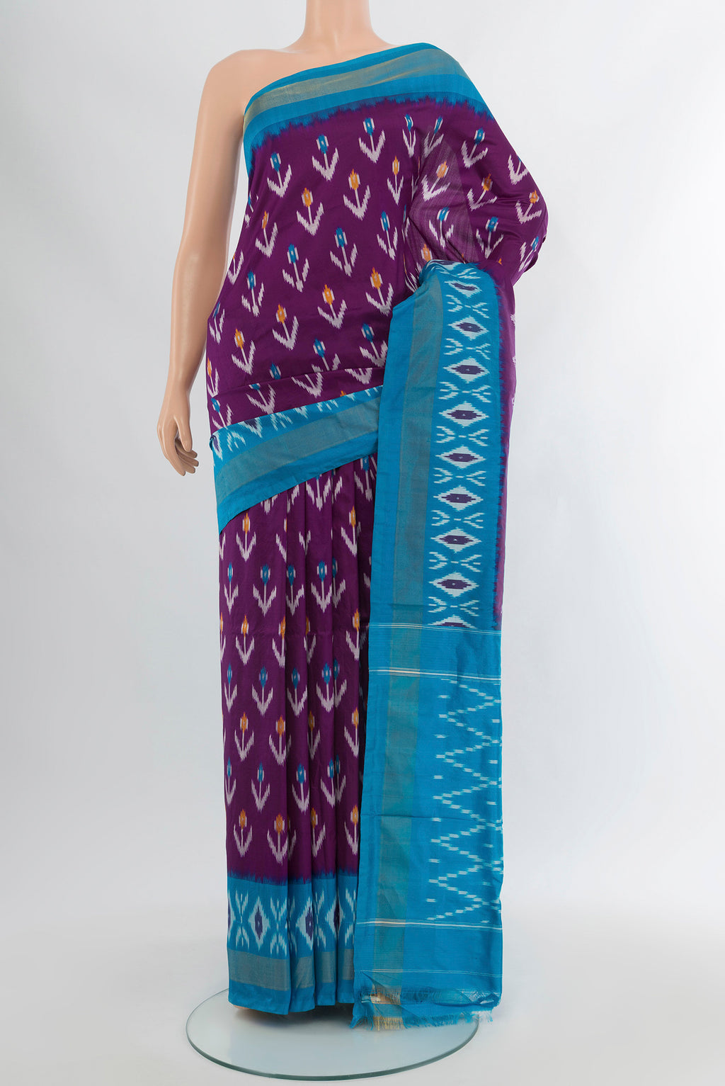 Violet Pochampally Silk Saree with Ikat Print on the body and Silk Border.  displayed on a mannequin