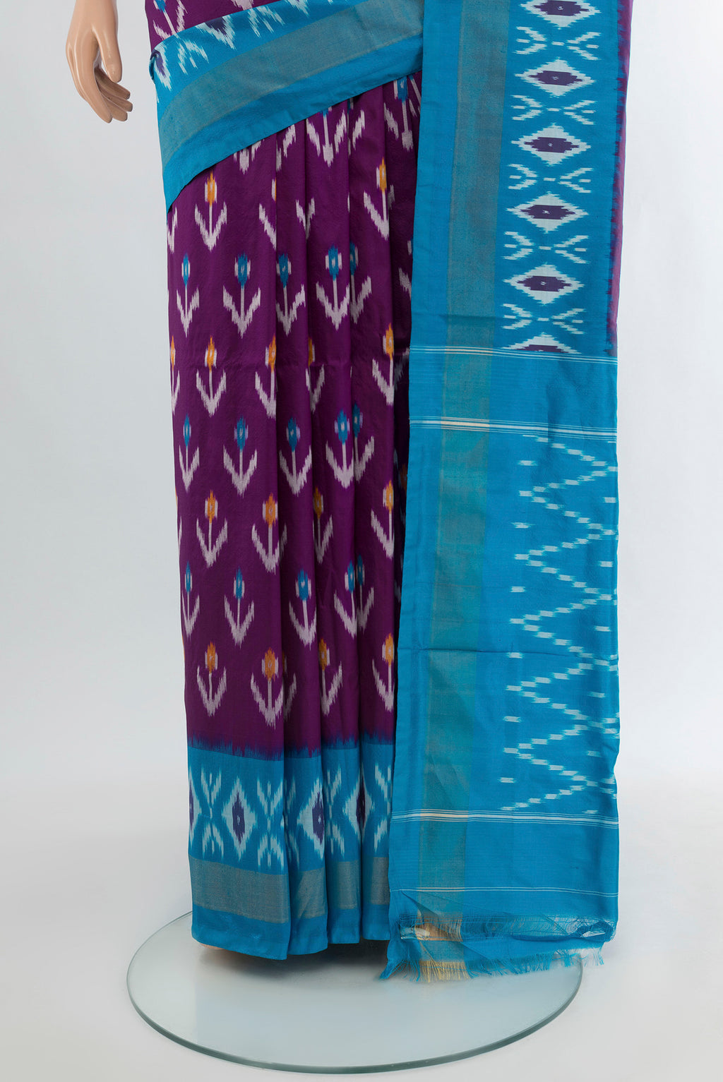 Pleats and pallu of Violet Pochampally Silk Saree with Ikat Print on the body and Silk Border. 