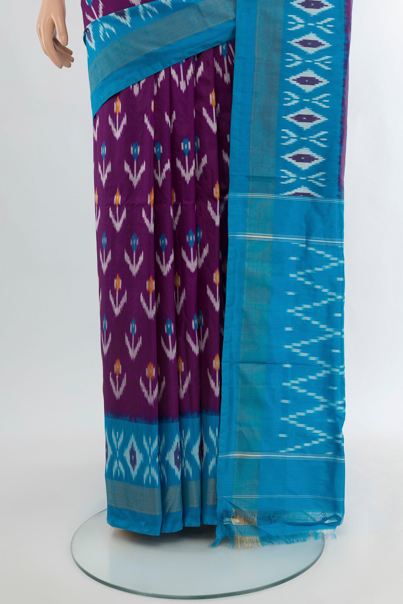 Pleats and pallu of Violet Pochampally Silk Saree with Ikat Print on the body and Silk Border. 
