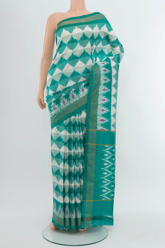 Multi Color Pochampally Saree with Ikat Print on the body and Silk Border.  displayed on a mannequin