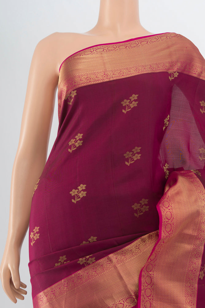 Border image of Maroon Kanjivaram Silk Saree with Zari Butta on the body and Silk Border. 