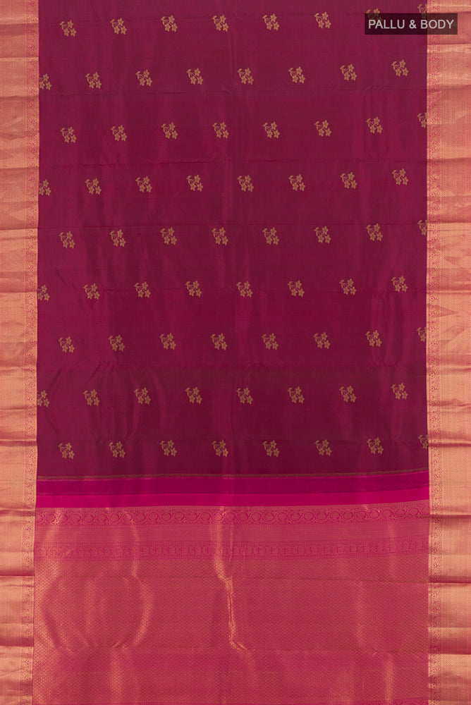 Flat view of Maroon Kanjivaram Silk Saree with Zari Butta on the body and Silk Border. 