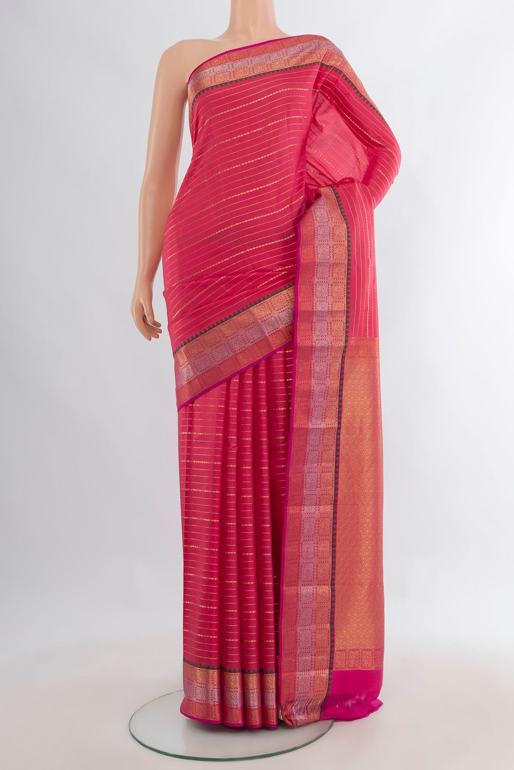 Pure Silk Coral Kanchipuram Saree with Stripes on the body and Zari Border.  displayed on a mannequin