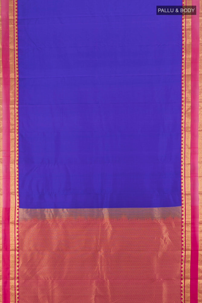 Flat view of Dark Blue Kanchipuram Silk Saree with Zari Butta on the body and Silk Border. 