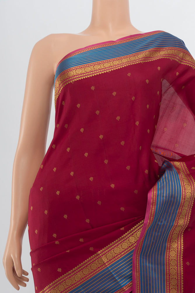 Border image of Maroon Kanchipuram Silk Saree with Zari Butta on the body and Silk Border. 