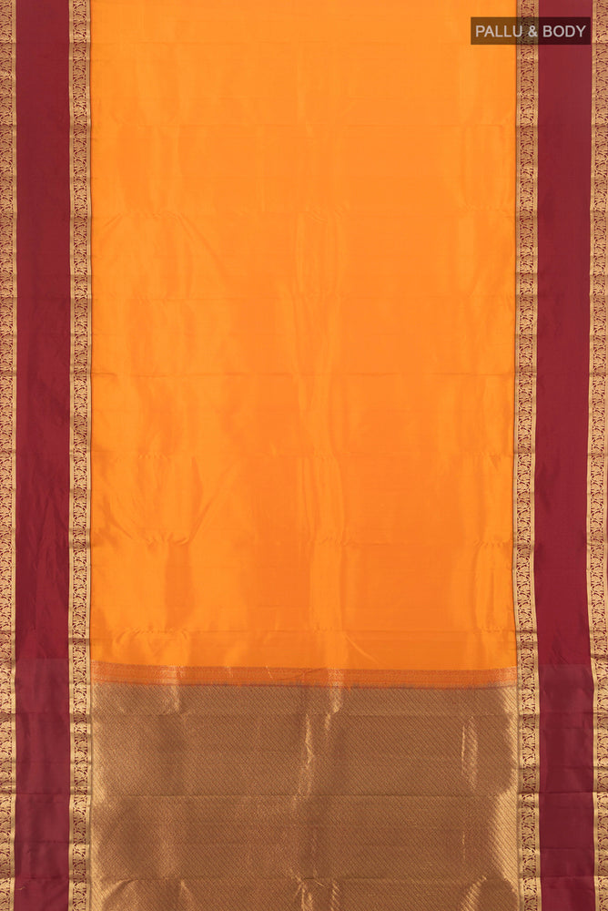 Flat view of Pure Silk Pure Zari Yellow Kanchipuram Saree with Plain Body and Silk Border. 