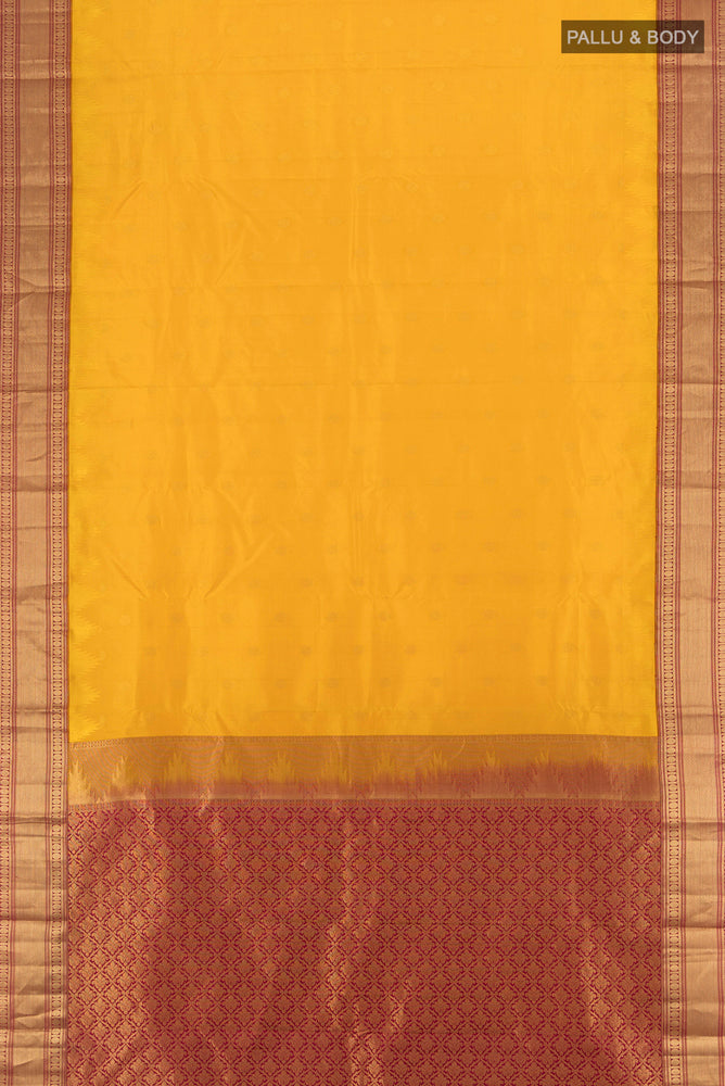 Flat view of Pure Silk Pure Zari Mustard Kanchipuram Saree with Zari Butta on the body and Silk Border. 