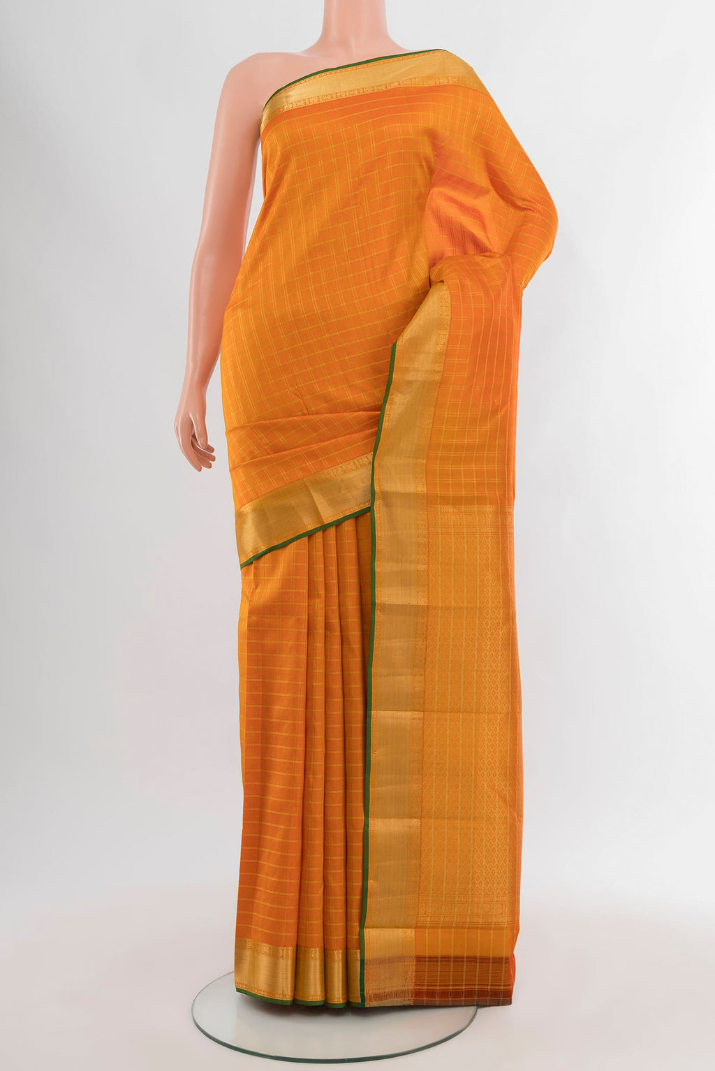 Orange Kanchipuram Silk Saree with Checked design on the body and Zari Border.  displayed on a mannequin