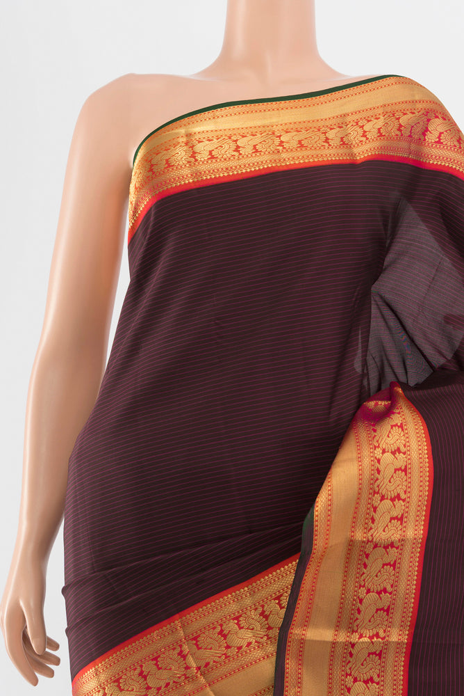 Border image of Brown Kanchipuram Silk Saree with Zari Butta on the body and Silk Border. 