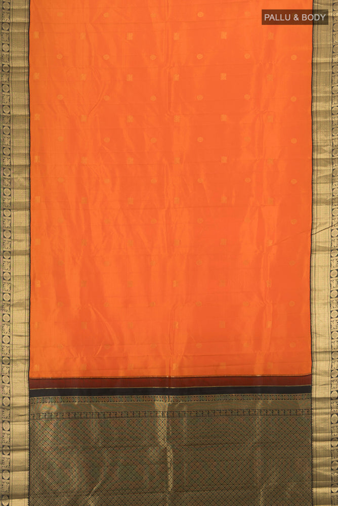 Flat view of Brick Orange Kanchipuram Silk Saree with Zari Butta on the body and Silk Border. 