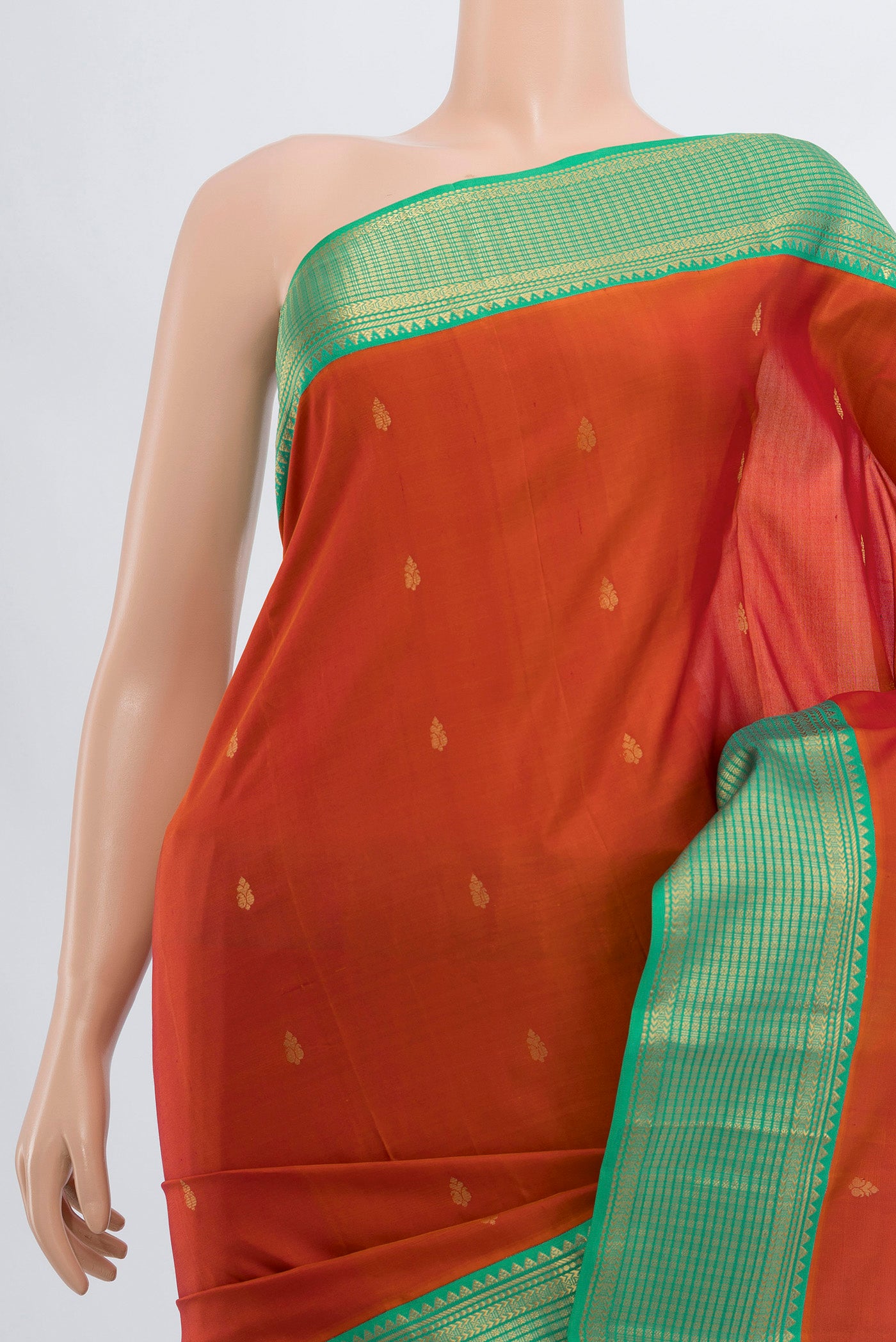 Border image of Peach Kanchipuram Silk Saree with Zari Butta on the body and Silk Border. 