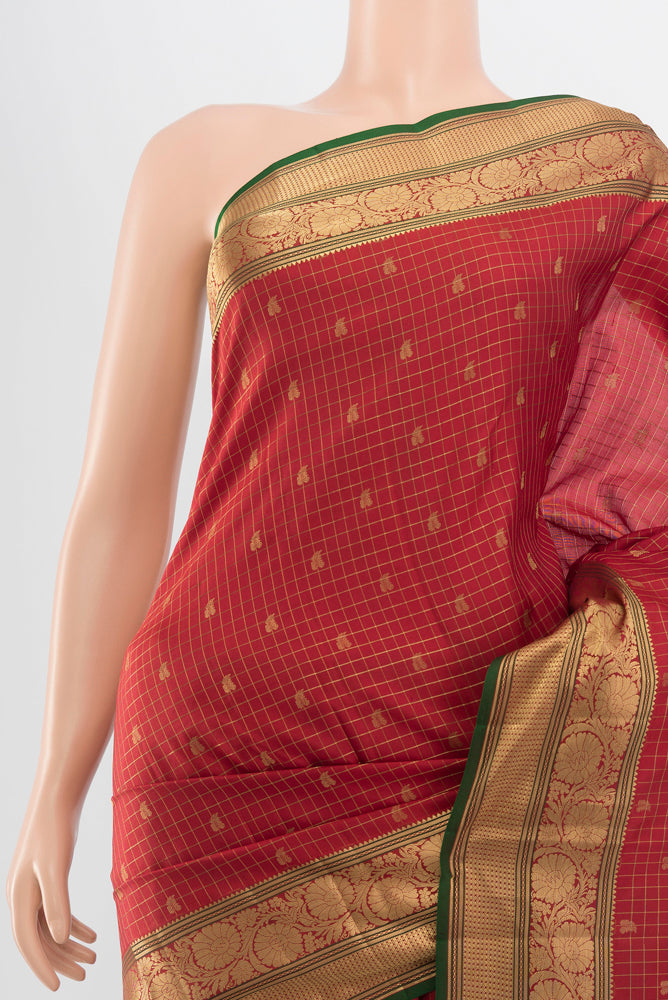 Border image of Pure Silk Pure Zari Maroon Kanchipuram Saree with Zari Butta on the body and Silk Border. 