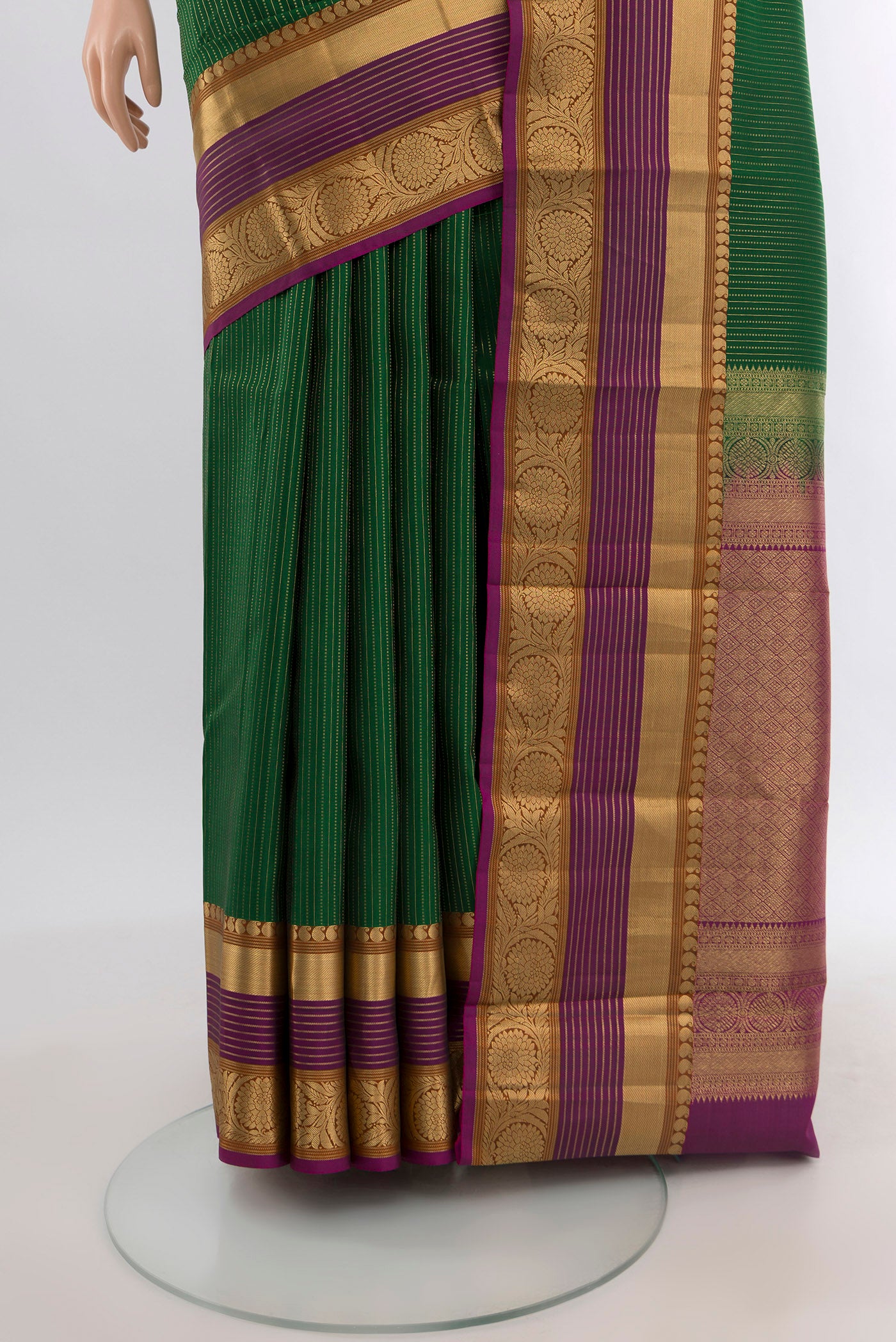 Pleats and pallu of Bottle Green Kanjivaram Silk Saree with Stripes on the body and Zari Border. 