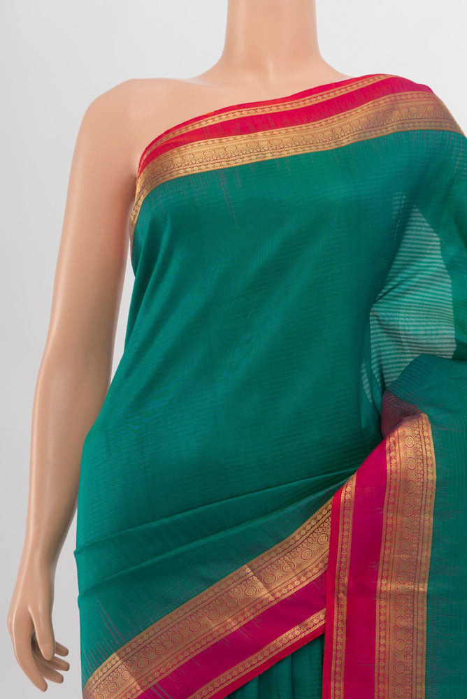 Border image of Peacock Blue Kanchipuram Silk Saree with Zari Brocade on the body and Silk Border. 