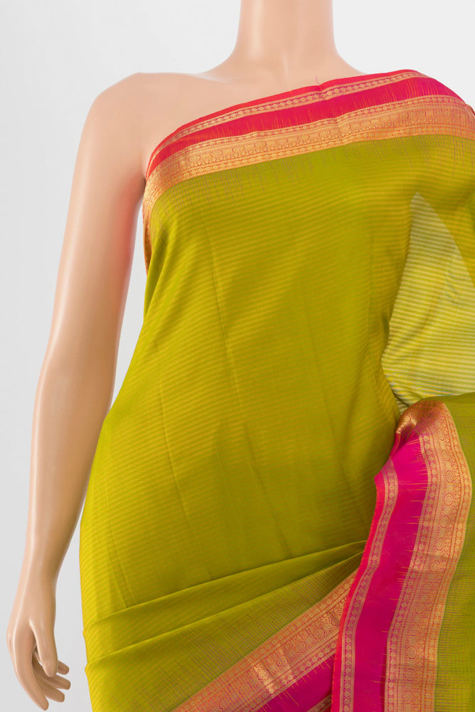 Border image of Light Green Kanchipuram Silk Saree with Zari Butta on the body and Silk Border. 