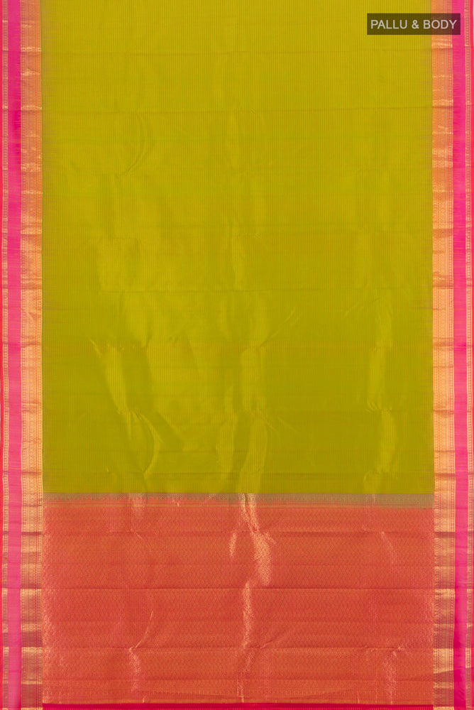 Flat view of Light Green Kanchipuram Silk Saree with Zari Butta on the body and Silk Border. 